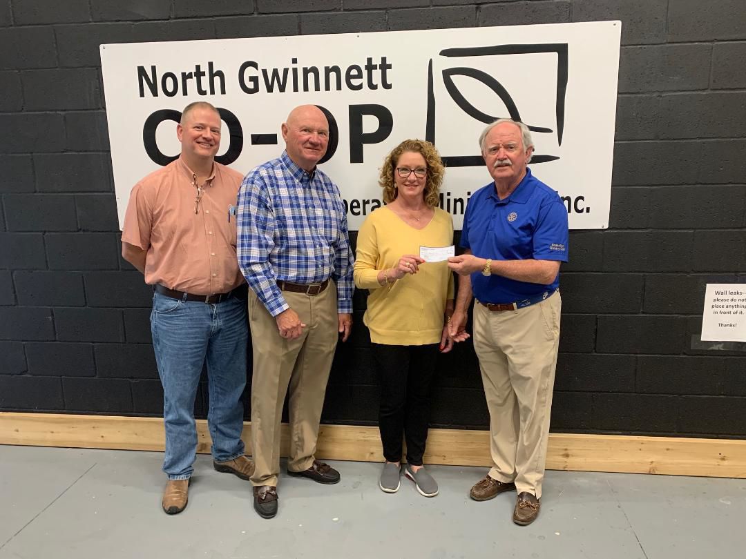 Rotary Club donates to North Gwinnett Co-Op
